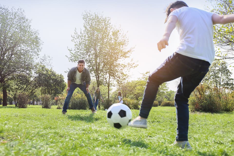 A family playing outside on a Saturday afternoon